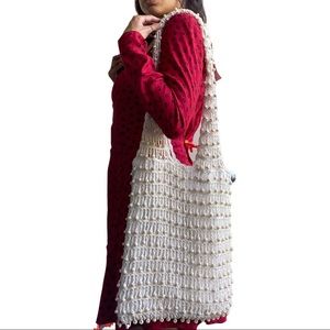 Beautiful beaded ivory bag with wooden beads.